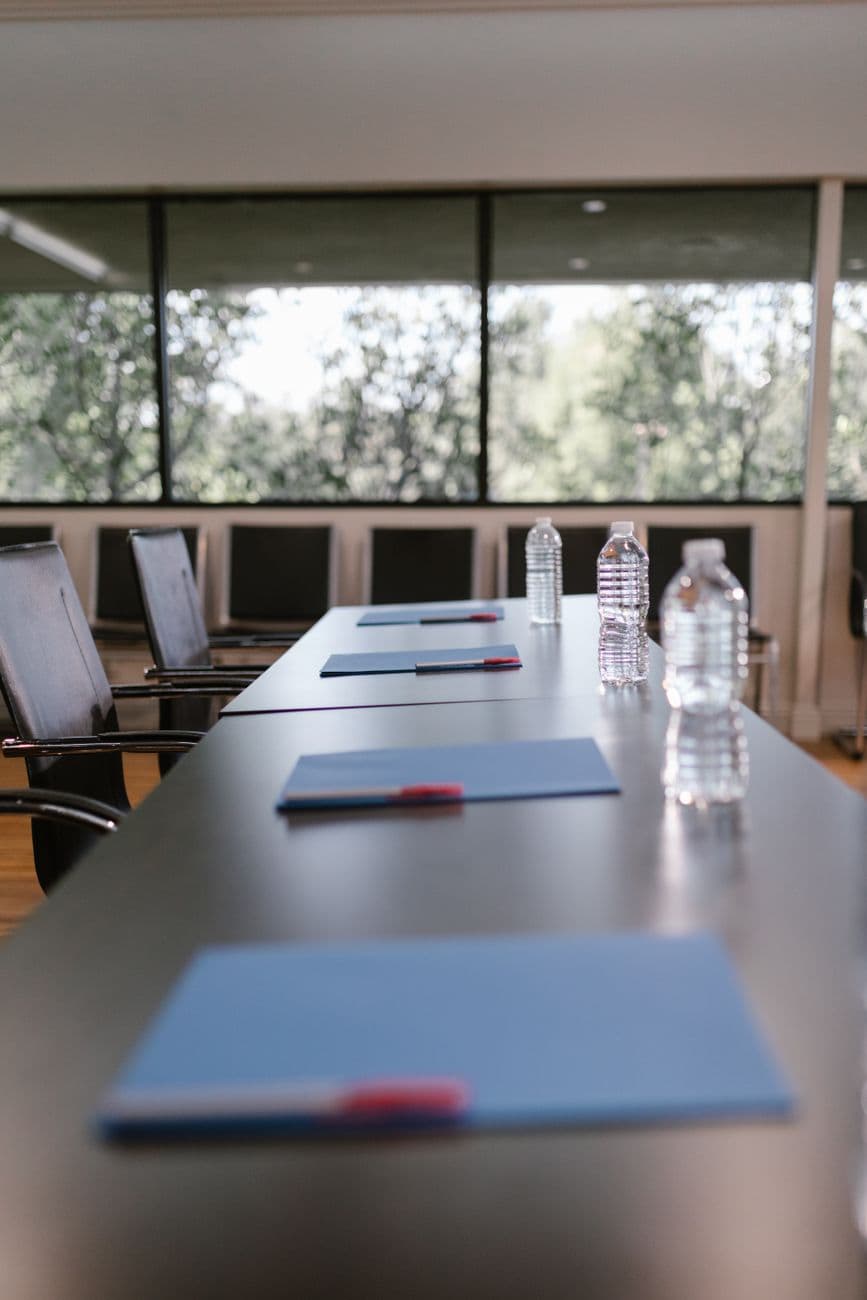 Conference room prepared for a formal institutional meeting